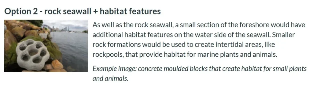 Rock seawall beside a coastal pedestrian path